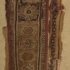 Fabric fragment - with rosettes (clavus ?)